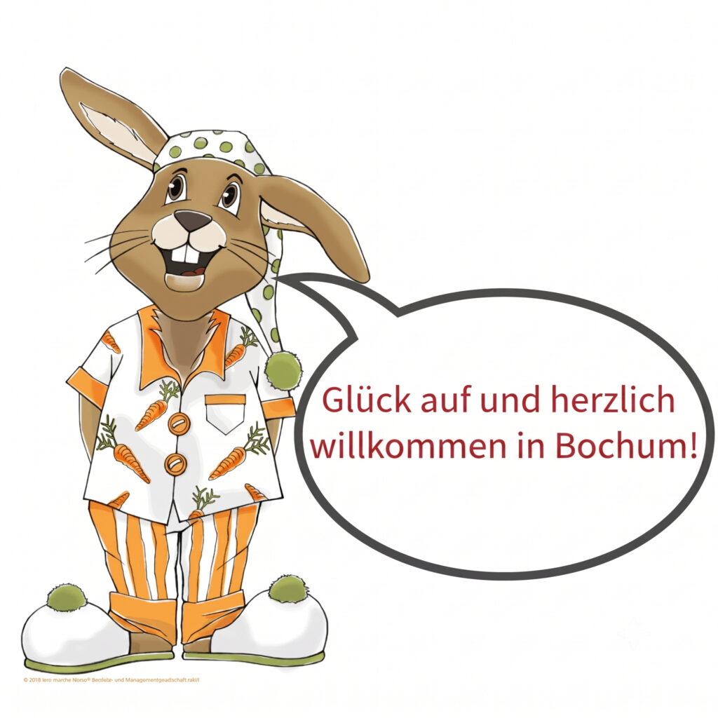 Freundlicher brauner Hase im Schlafanzug orange weiss mit Sprechblase